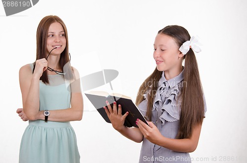 Image of Schoolgirl meets homework