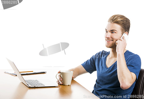 Image of Young man and talking at phone