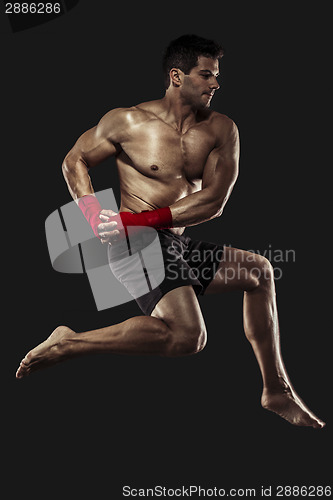 Image of Man practicing body combat