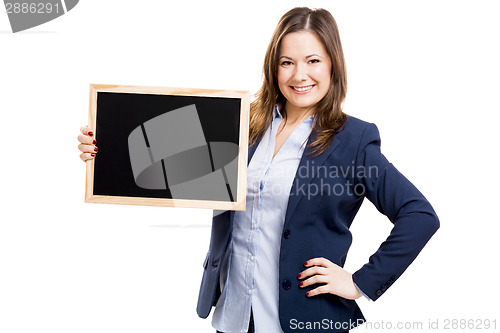 Image of Business woman holding a shalkboard