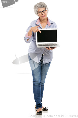 Image of Elderly woman showing something on a laptop