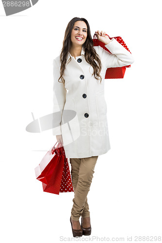 Image of Beautiful woman with shopping bags