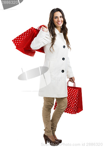 Image of Beautiful woman with shopping bags