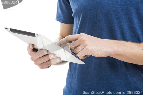 Image of Young man working with a tablet