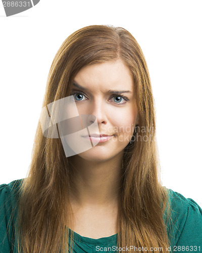 Image of Young woman with a suspicious face