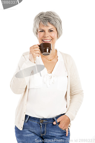 Image of Elderly woman drinking coffee