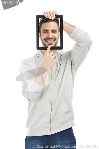 Image of Man holding a tablet