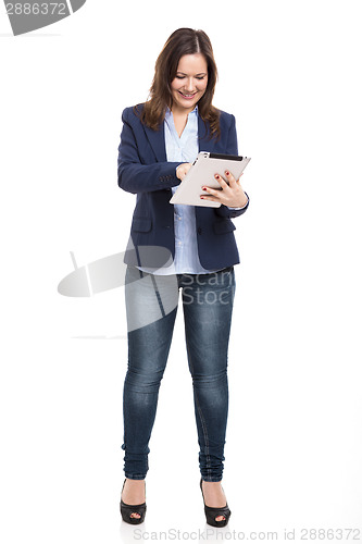 Image of Business woman working with a tablet