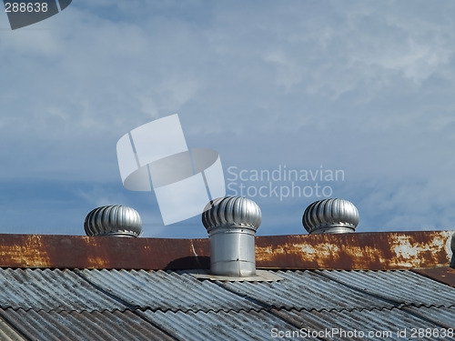 Image of Three ventilators on a roof