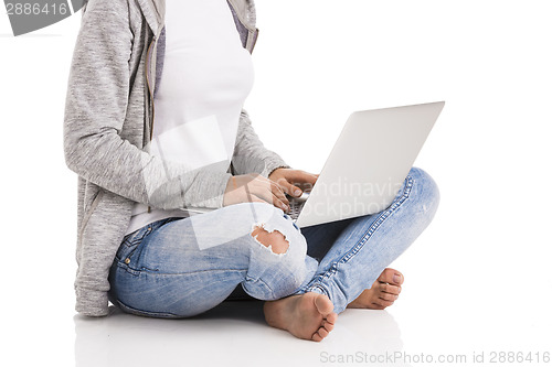 Image of Woking with a laptop