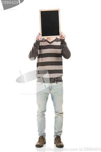 Image of Man holding a chalkboard