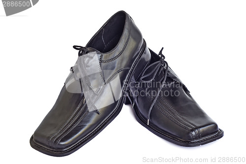 Image of Man's shoes of black color on a white background.