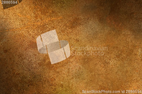 Image of Grungy distressed rusty surface lit diagonally