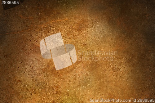 Image of Grungy distressed iron surface lit from above