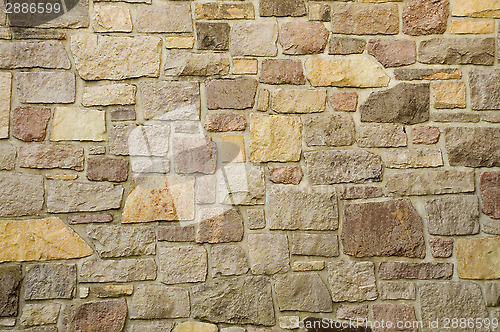 Image of Masonry Wall of Multicolored Stone