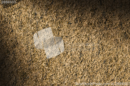 Image of Granite rock stone texture lit diagonally