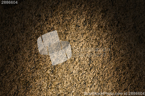 Image of Granite rock stone texture lit dramatically