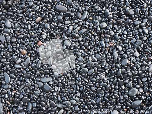 Image of black rock pebbles mineral stones background