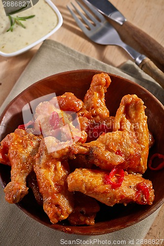 Image of fried chicken wings with sweet chili sauce