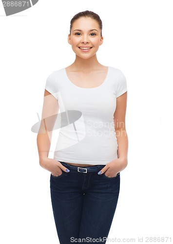 Image of smiling young woman in blank white t-shirt
