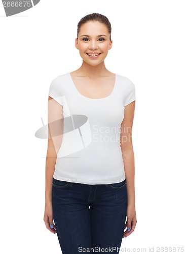 Image of smiling young woman in blank white t-shirt