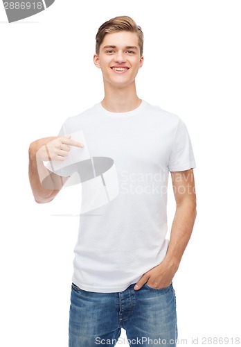 Image of smiling young man in blank white t-shirt