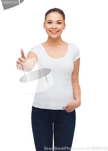 Image of smiling young woman in blank white t-shirt