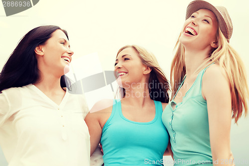 Image of girls looking up in the sky