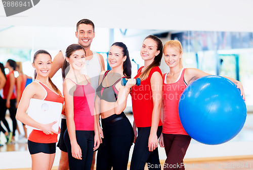 Image of group of smiling people in the gym