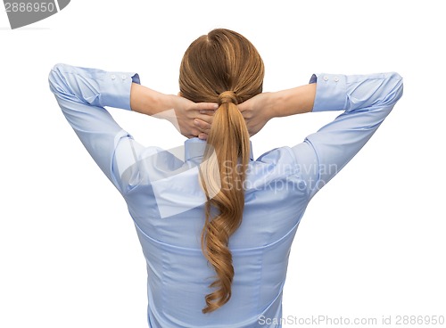 Image of businesswoman or teacher in shirt from back