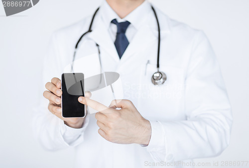 Image of doctor pointing at smartphone