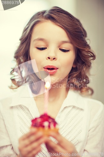 Image of girl with cupcake