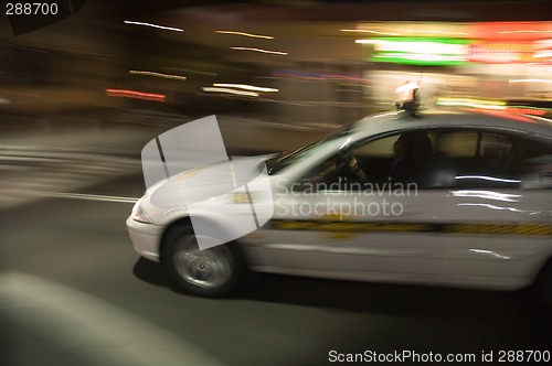 Image of speeding taxi