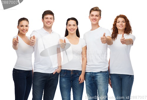 Image of smiling teenagers in t-shirts showing thumbs up