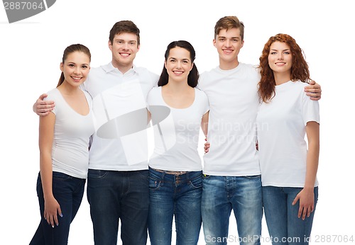 Image of group of smiling teenagers in white blank t-shirts