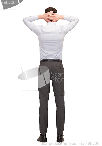 Image of businessman or teacher from back