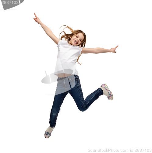 Image of smiling little girl jumping