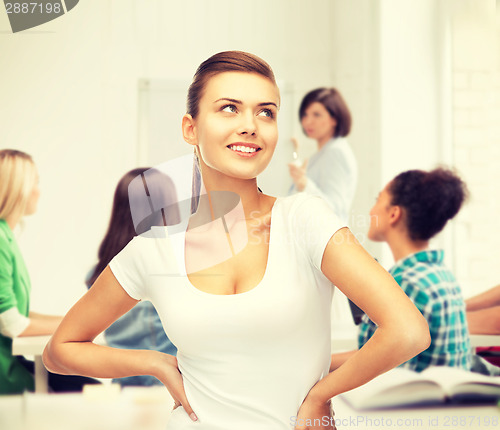 Image of student girl in blank white t-shirt at school
