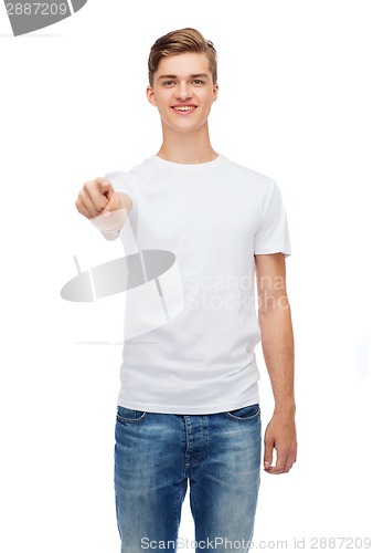 Image of smiling young man in blank white t-shirt