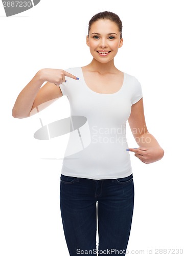 Image of smiling young woman in blank white t-shirt