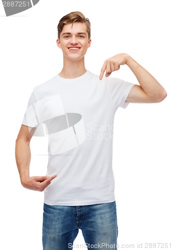 Image of smiling young man in blank white t-shirt