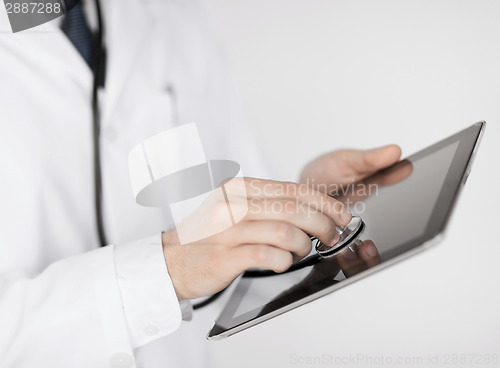 Image of doctor with stethoscope and tablet pc