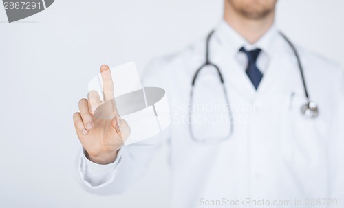 Image of doctor working with virtual screen