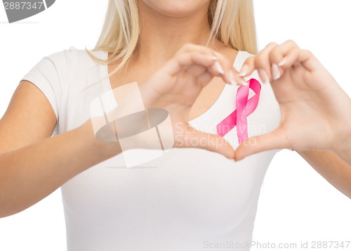 Image of young woman with pink cancer awareness ribbon