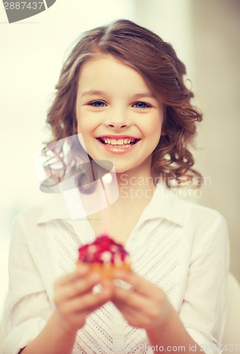 Image of girl with cupcake
