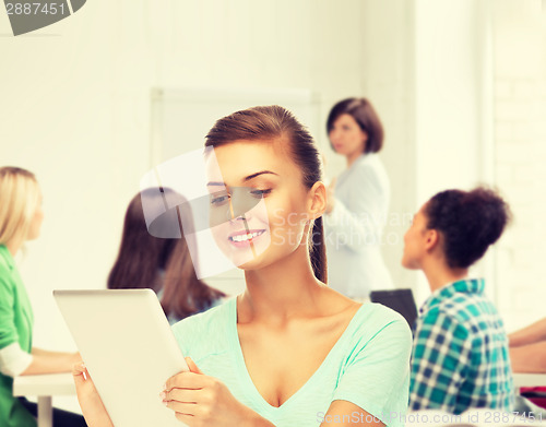 Image of student with tablet pc in college