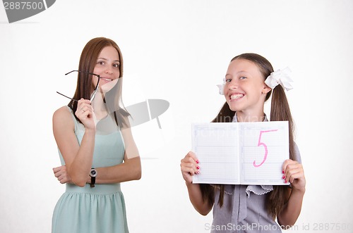 Image of Schoolgirl very happy received five