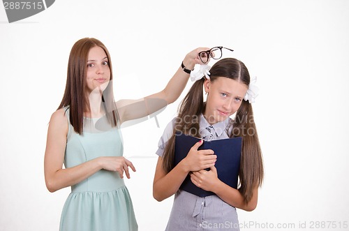 Image of Teacher scolds student