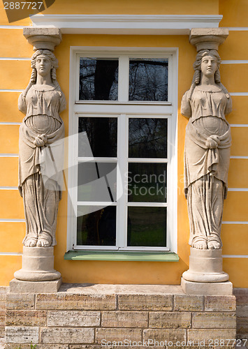 Image of window with sculptures