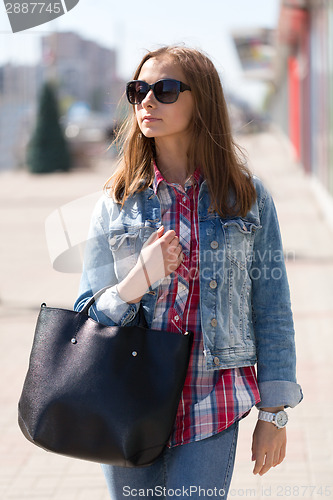 Image of Woman with a handbag